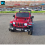 Полноприводный электромобиль Jeep Rubicon X004XX красный глянец