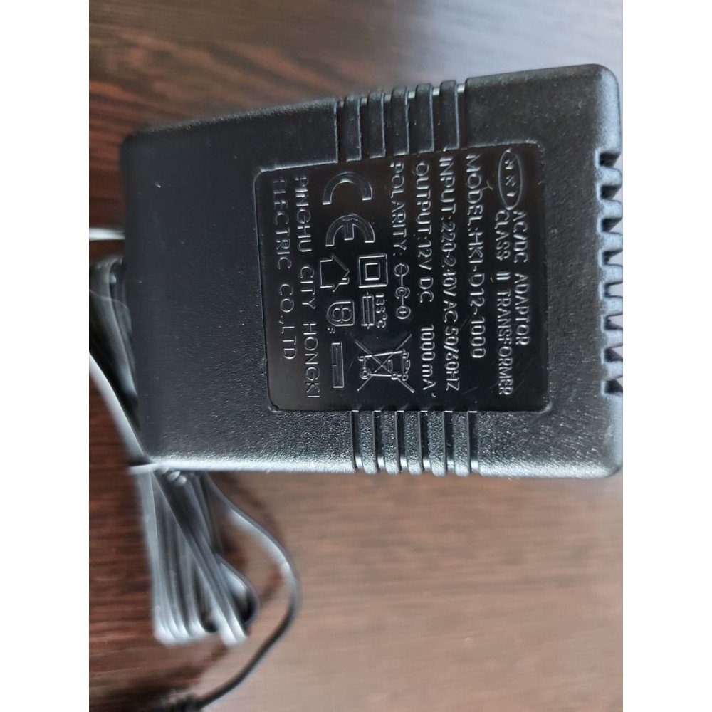 Зарядное устройство AC-DC Adaptor 12V 1000 mAh - FLH480608