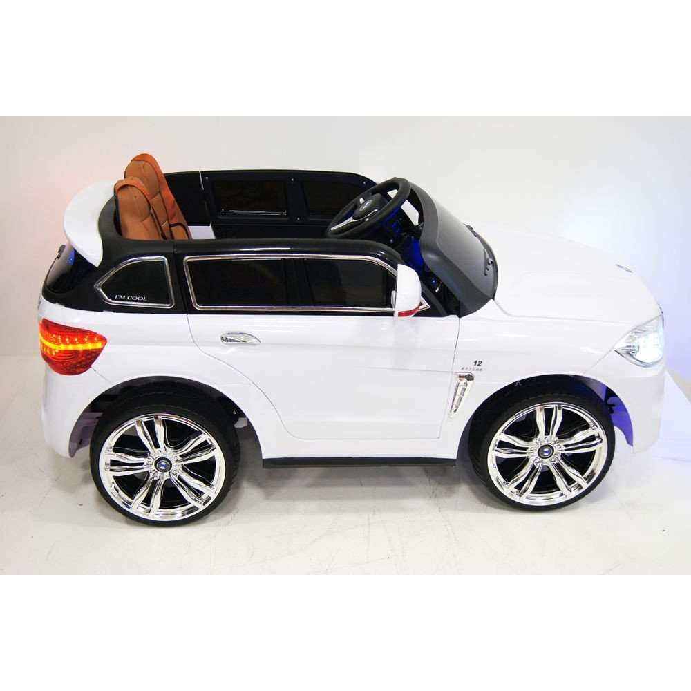 Детский электромобиль Е002КХ белый