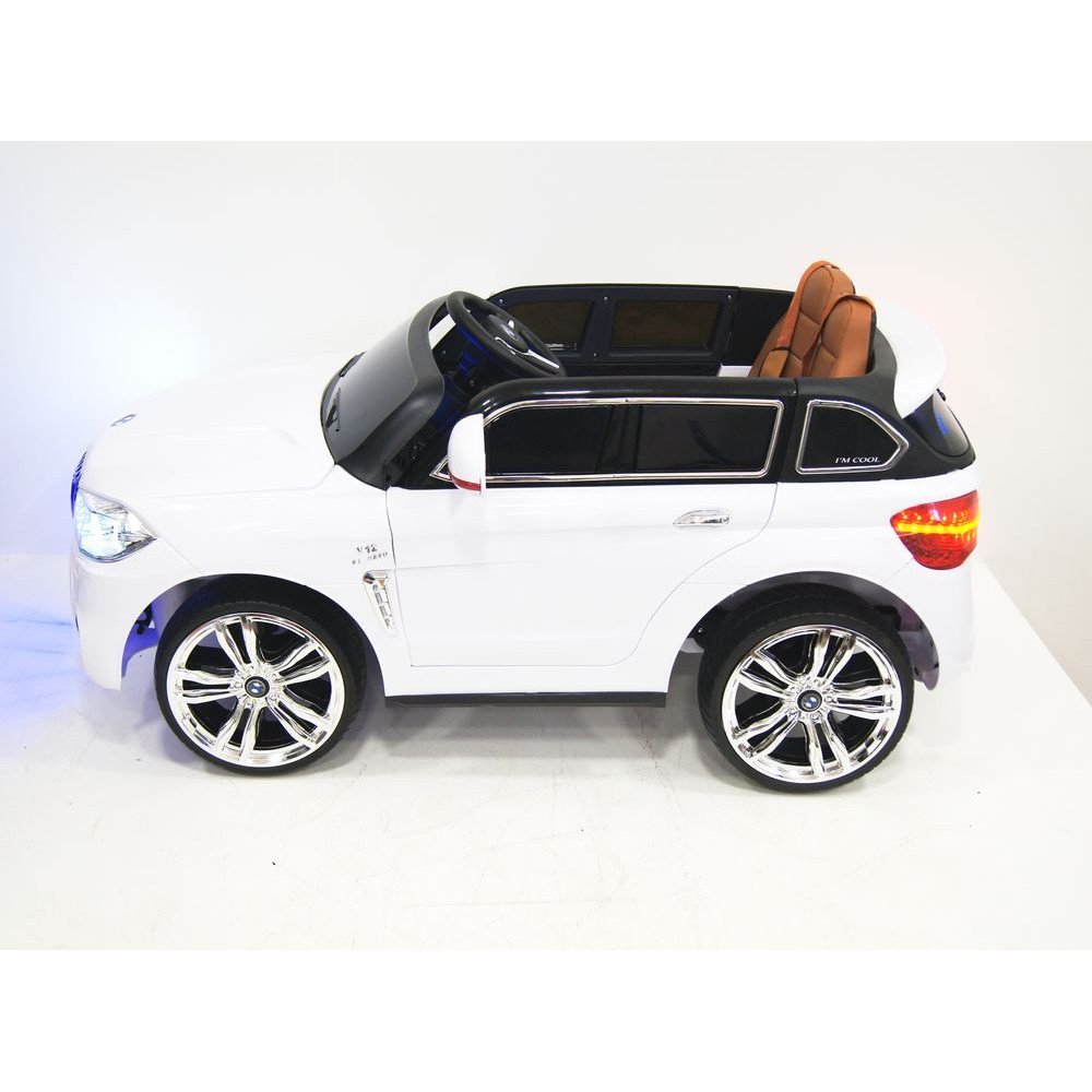 Детский электромобиль Е002КХ белый